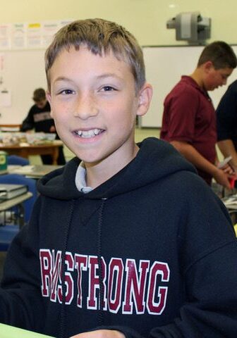 Blake Bottarini at school as a young boy